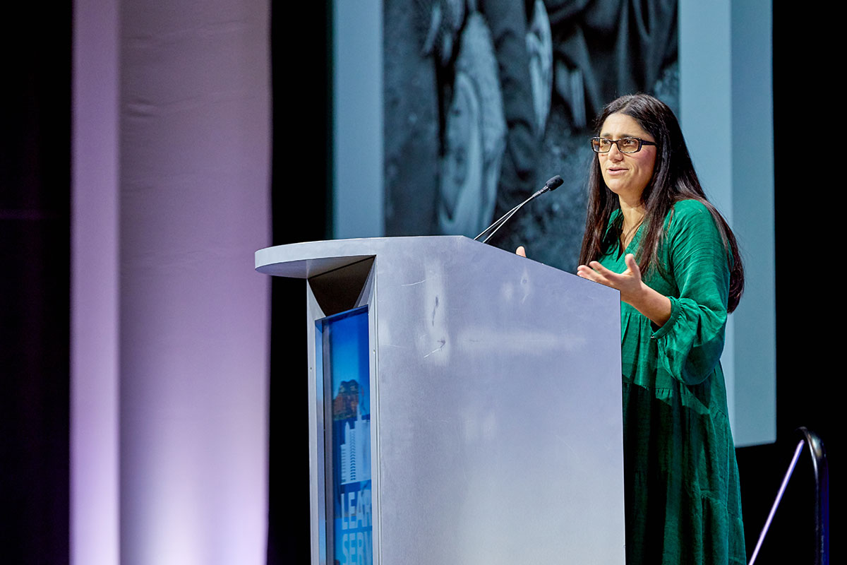 Mona Hanna-Attisha speaks at a podium at the AAMC annual meeting in 2019.