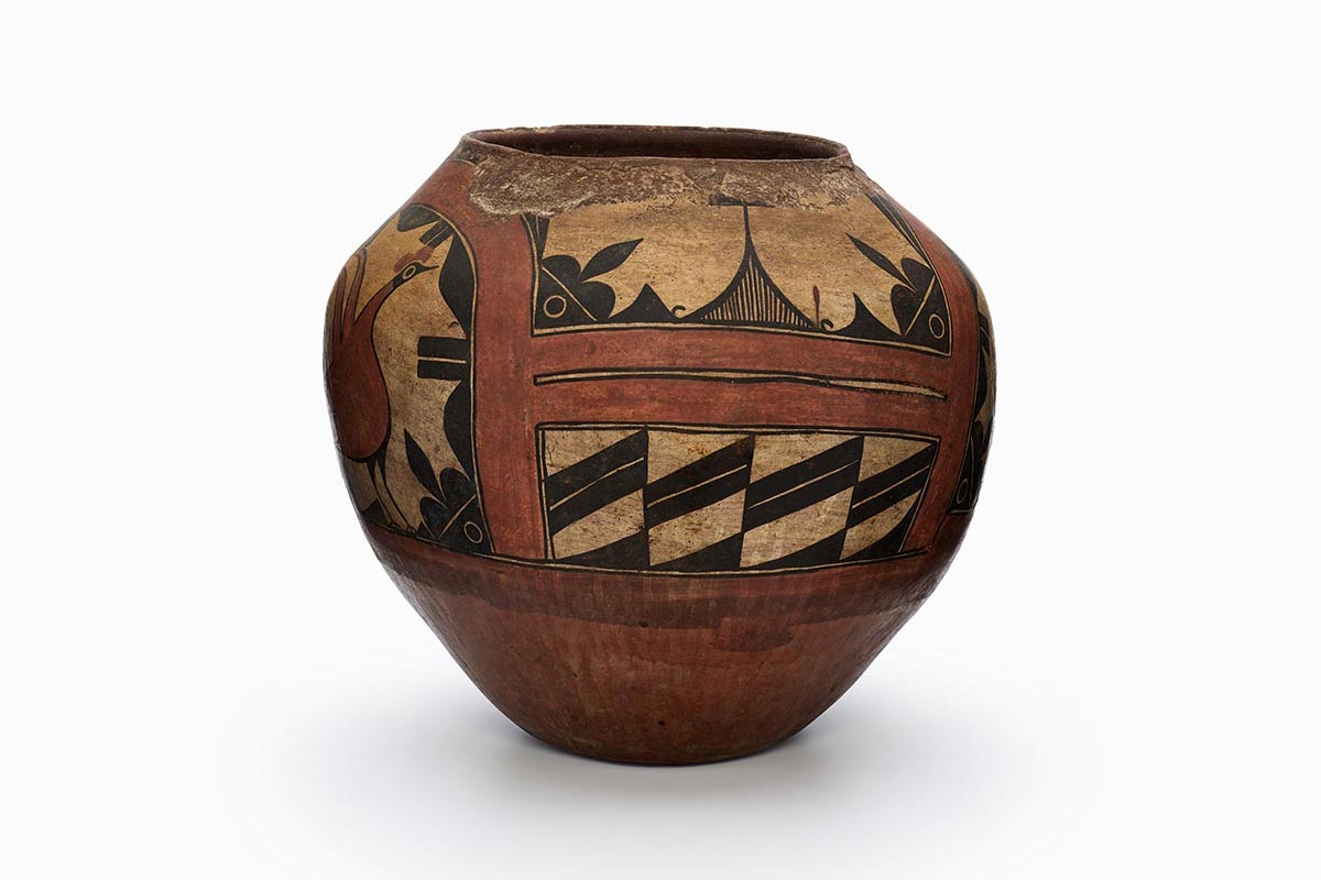 A three-color Zia polychrome pot with black and red painted decoration.