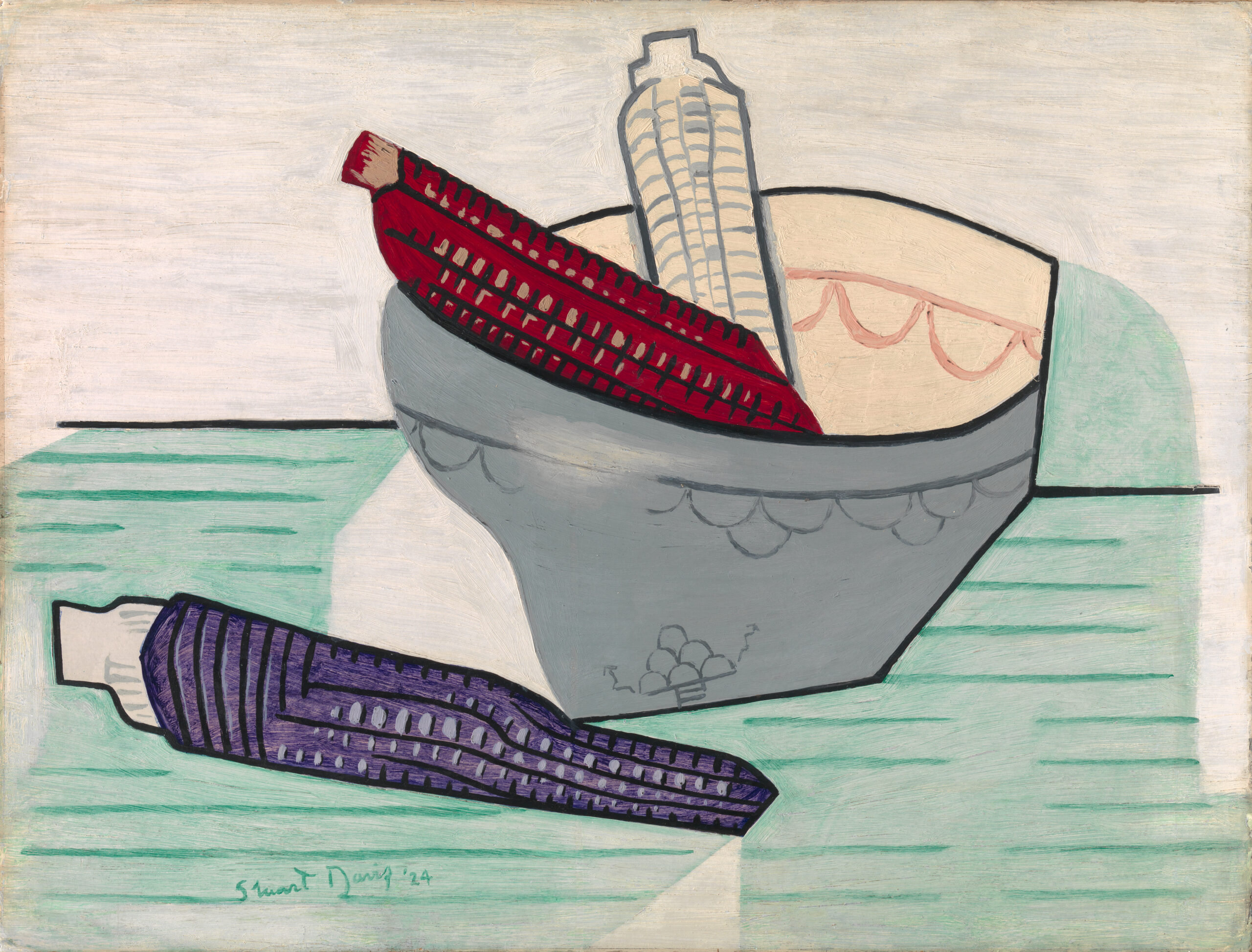 Still life of violet corncob on a striped green tablecloth in front of red and white corncobs in an angular grey bowl.