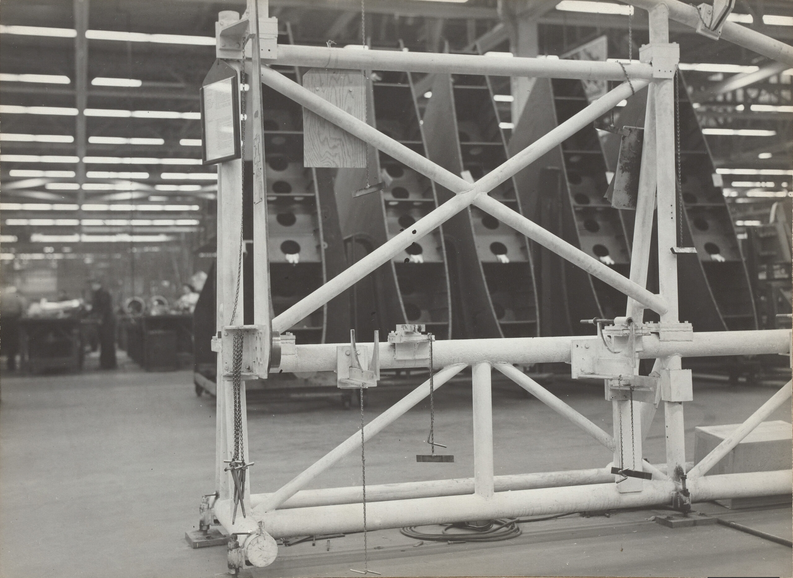 Black and white photograph of an aircraft plant fixture.