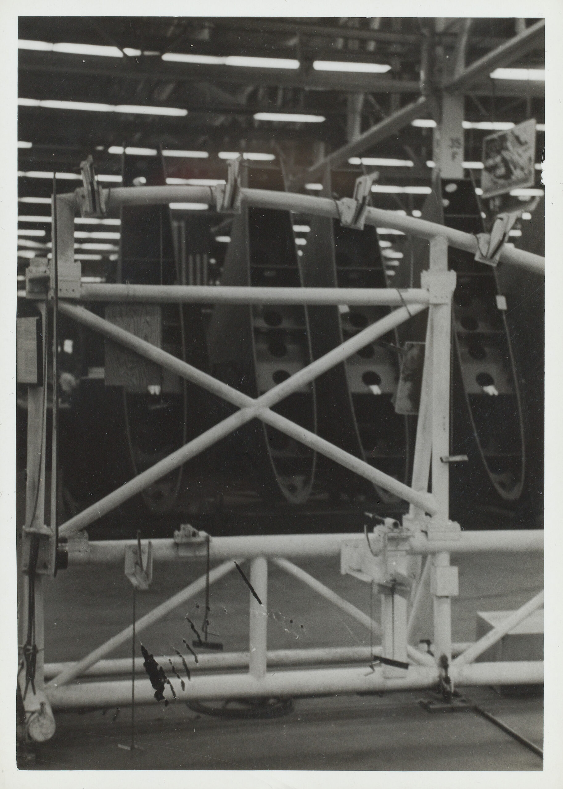 Black and white photograph of an aircraft plant fixture.