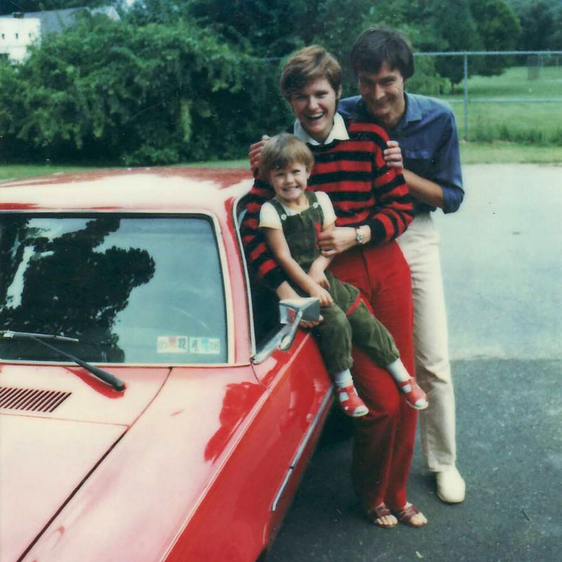 Katalin Karikó's family and their red car in 1985.