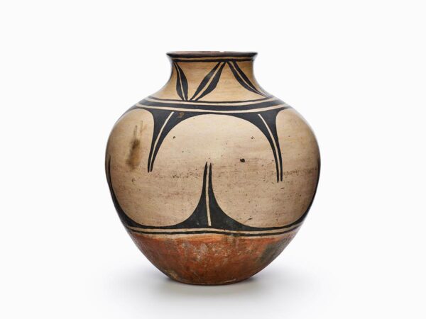 A Kewa jar painted beige and black, with two bands of design, and a rust-colored bottom.