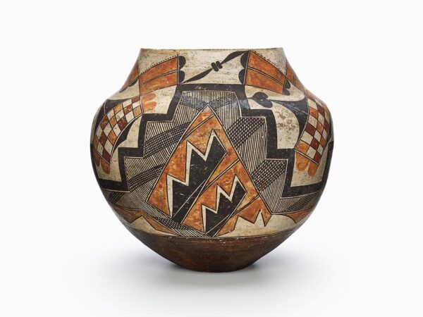 A four-color olla decorated with geometric shapes and checkered designs.