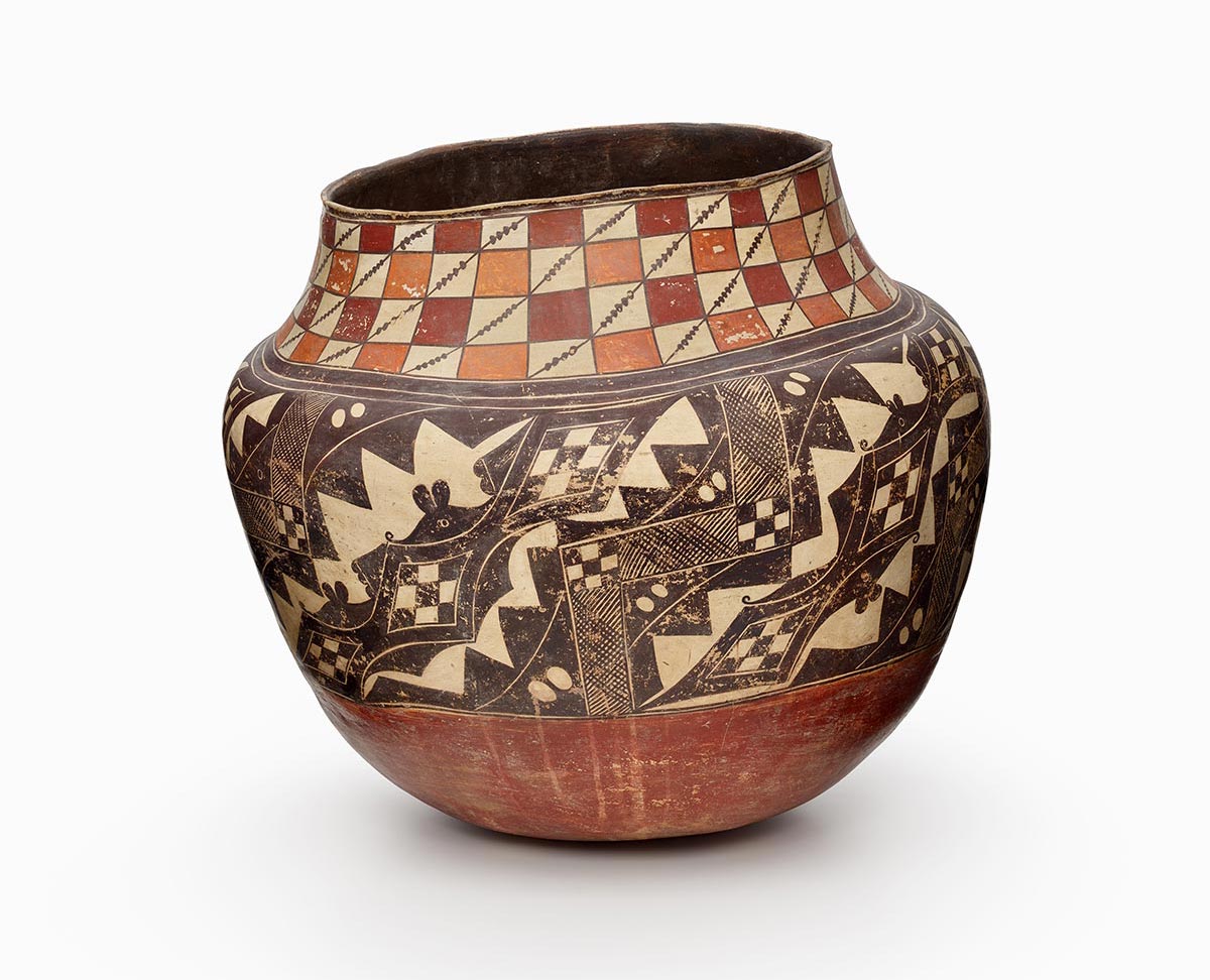 An Acoma water jar with a remarkable checkerboard pattern around the neck.