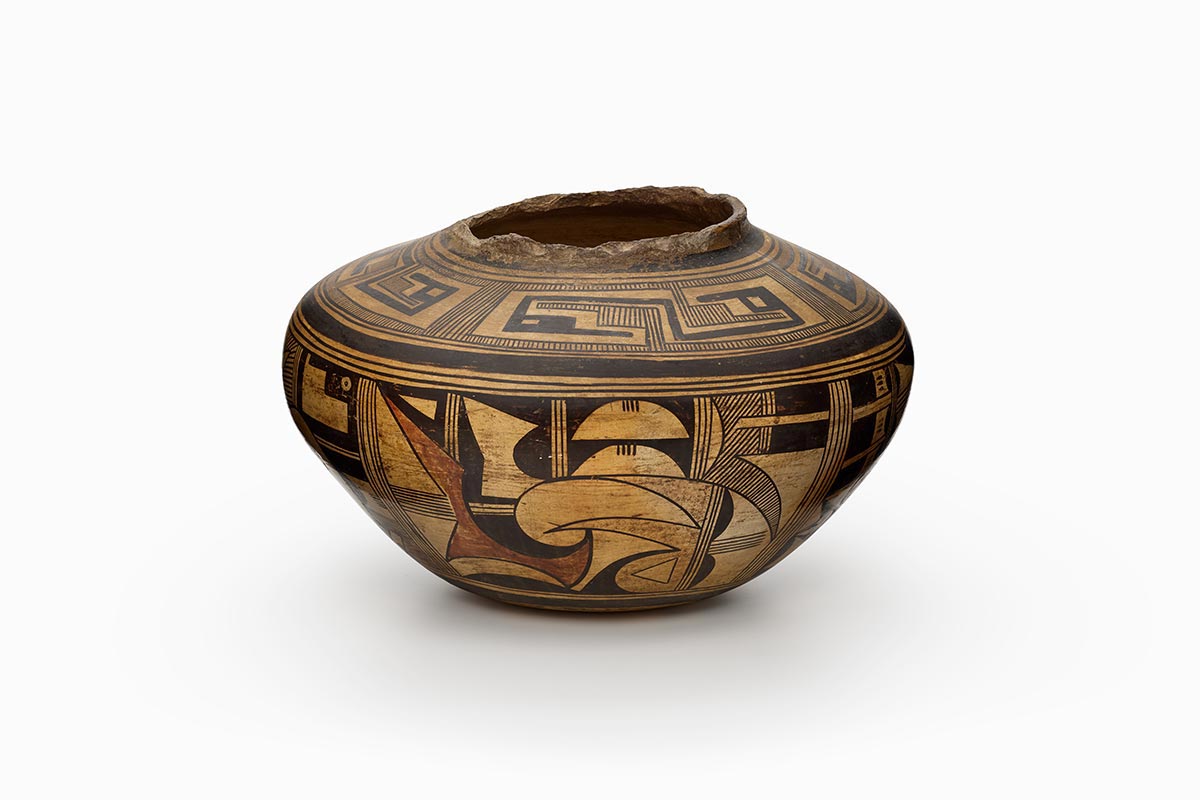 Tewa/Hopi Hano jar with geometric shapes in black and red.